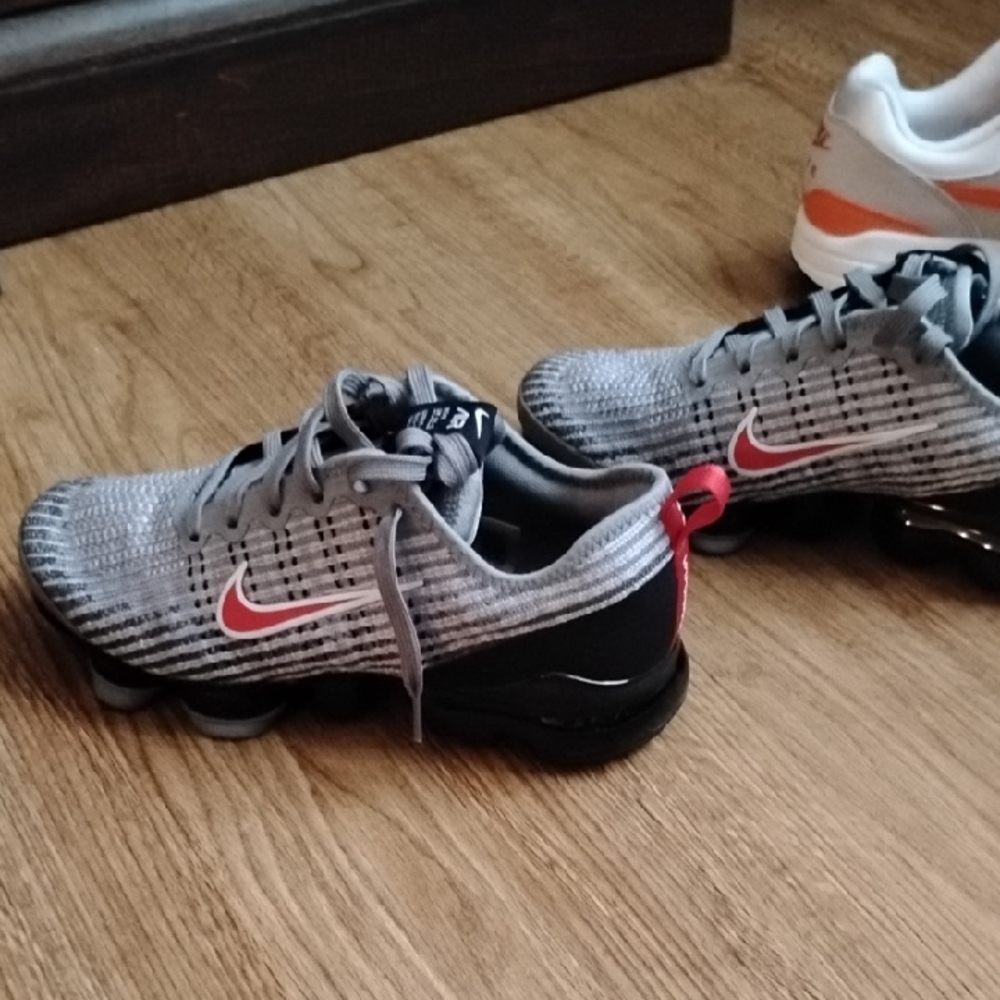 Nike Kids Gray and Black Sneakers with Red Accents